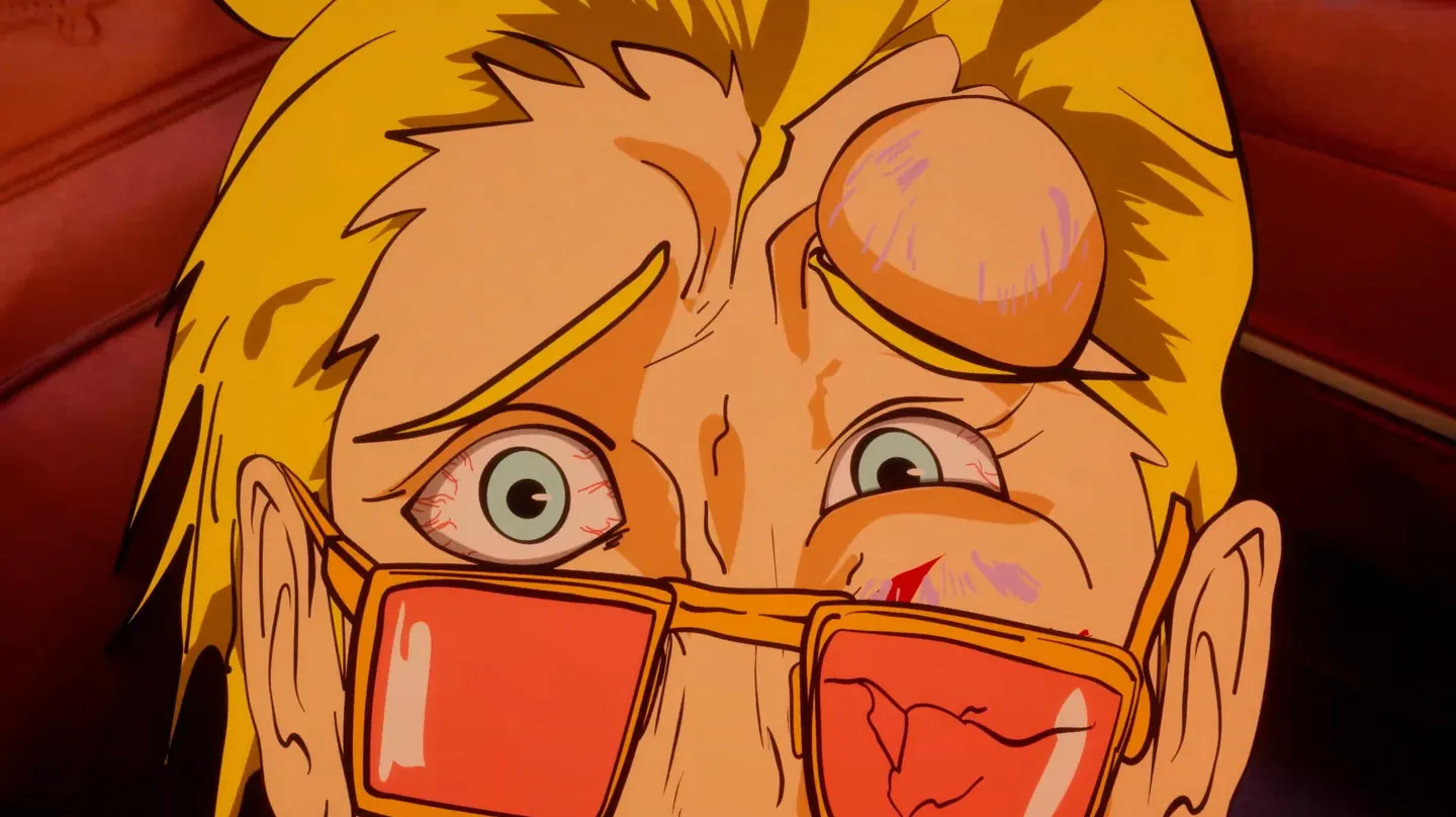 Extreme close-up of a blond man’s wide, frightened eyes above his tinted glasses.