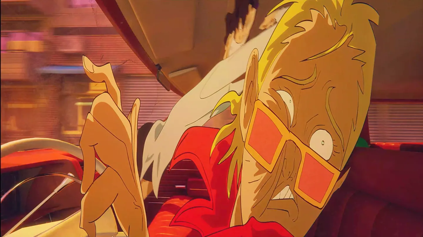 A blond man in tinted glasses grimaces at the wheel of a speeding car as a white-sleeved arm reaches across.